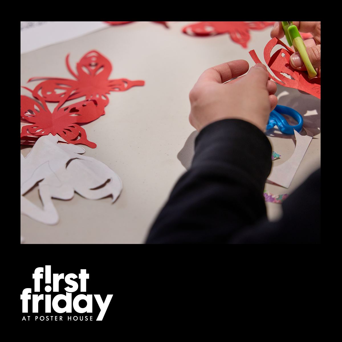 A photo image of a person cutting designs into paper